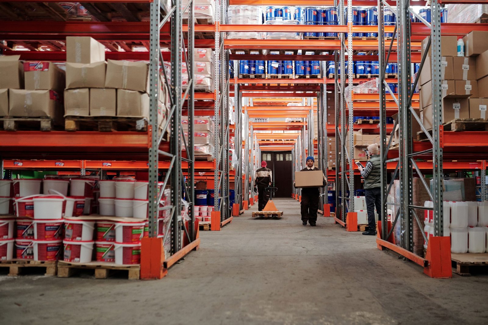 Warehouse worker organizing inventory for freight forwarding