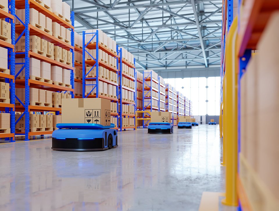 Warehouse racks and pallets used to consolidate supplier cargo before shipping to Mzuzu